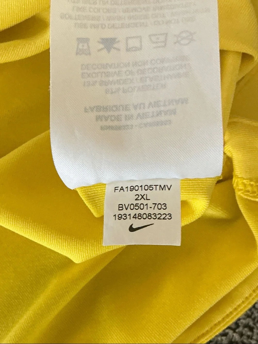 Nike Yellow Short-Sleeve Athletic Jersey with Chevron Accent